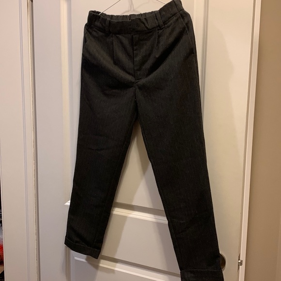 New dress pants. Size xs. Waist has some stretch. Dark with faint pinstrip. - Picture 1 of 4